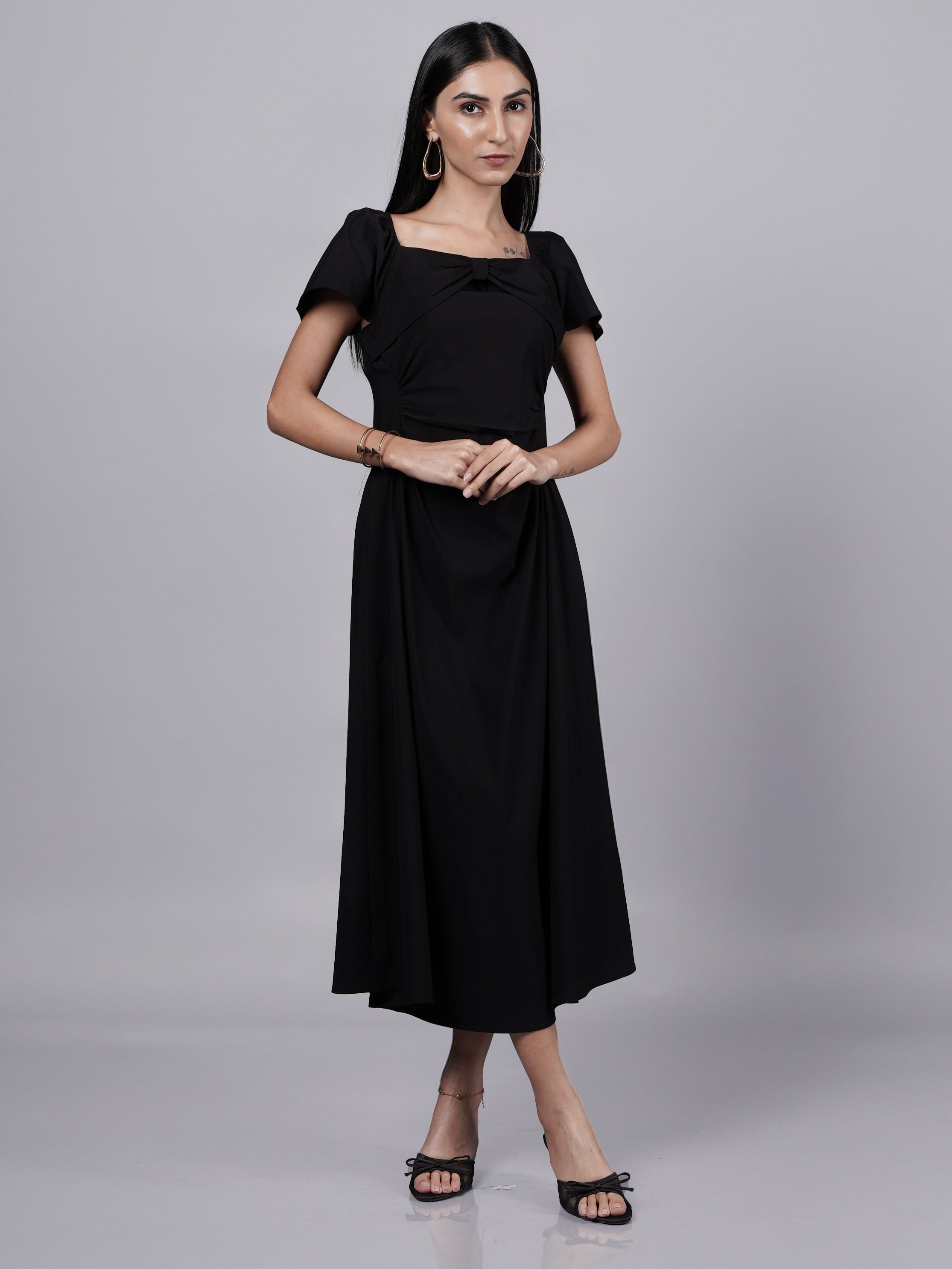 Black Dress Featuring Baddie Bows and Vintage-Inspired Sleeves