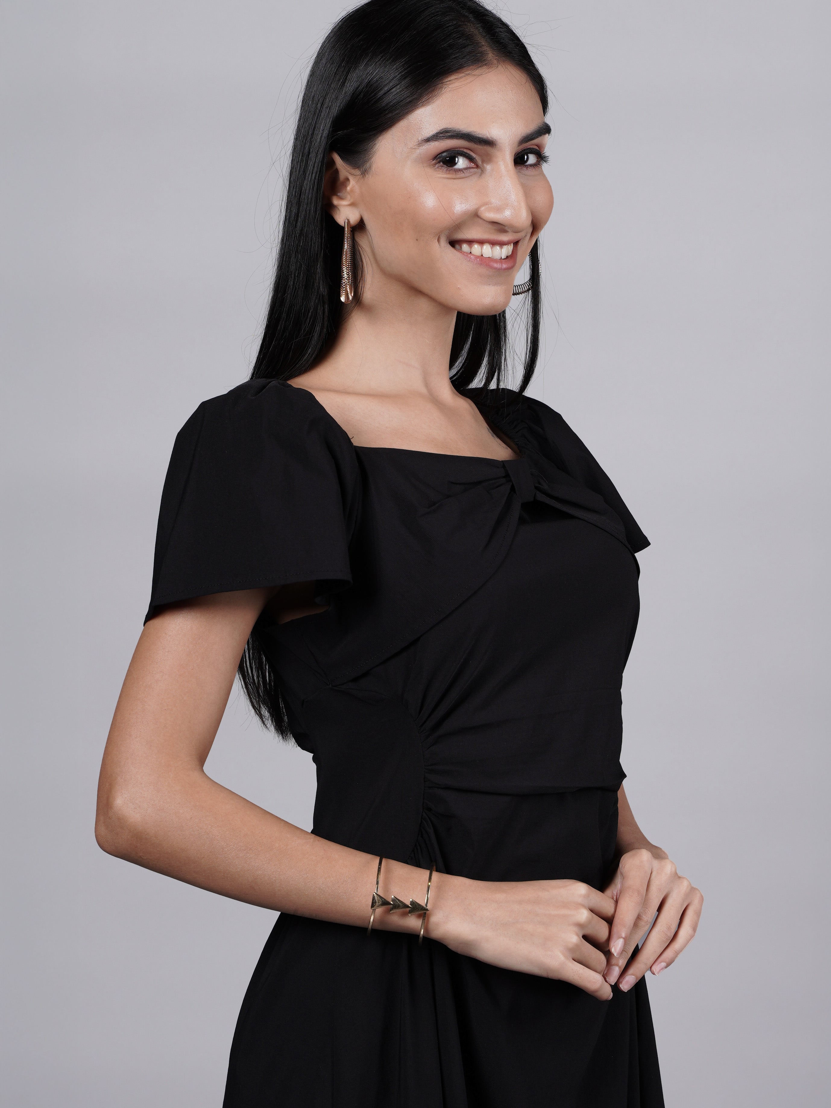 Black Dress Featuring Baddie Bows and Vintage-Inspired Sleeves